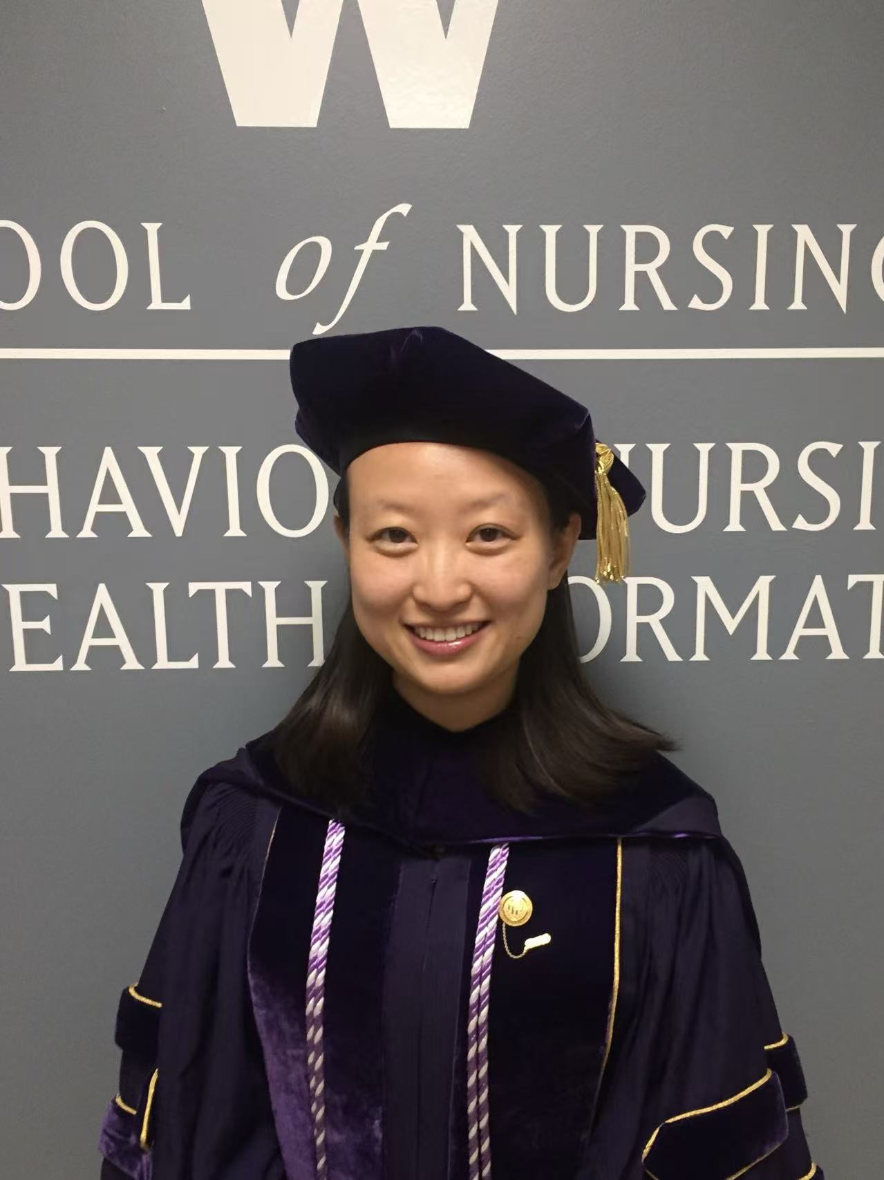 Cathy Chen in her University of Washington doctoral graduation gown